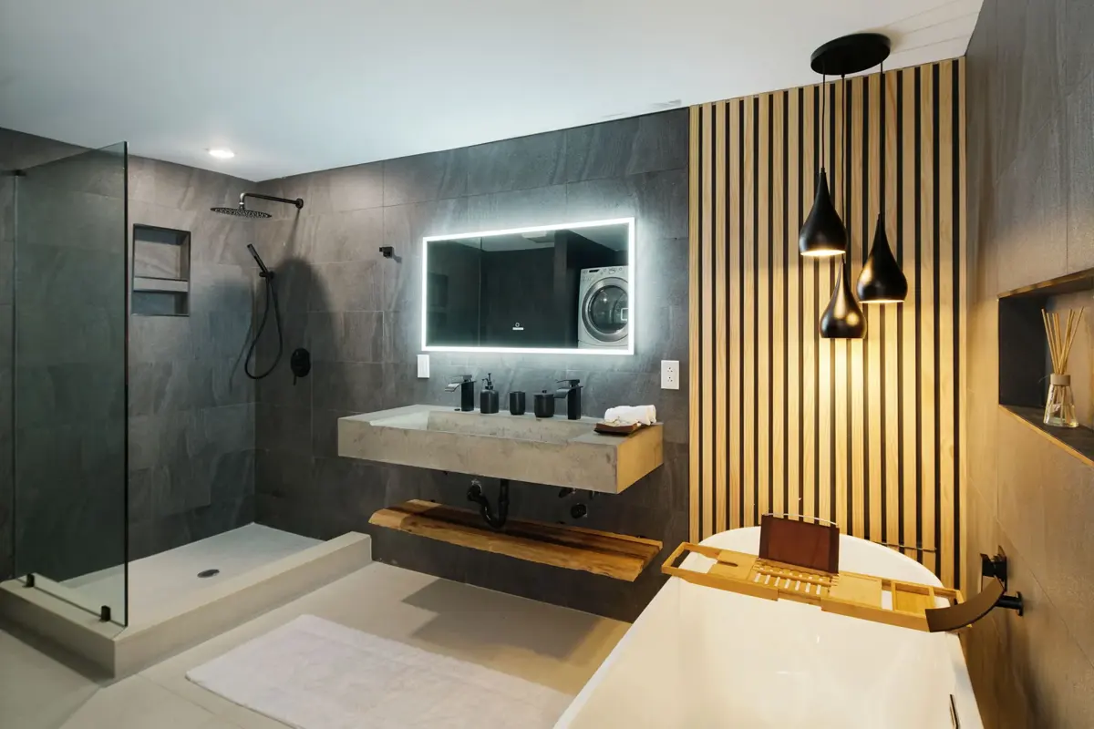Completed spa-like bathroom remodel in a former dirt basement space